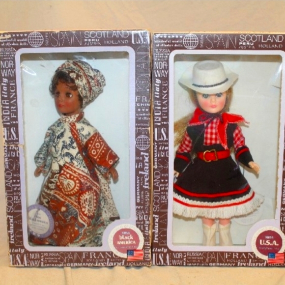 two vintage "the wonderful world of effanbee" dolls. one is still secured in the - Picture 1 of 4